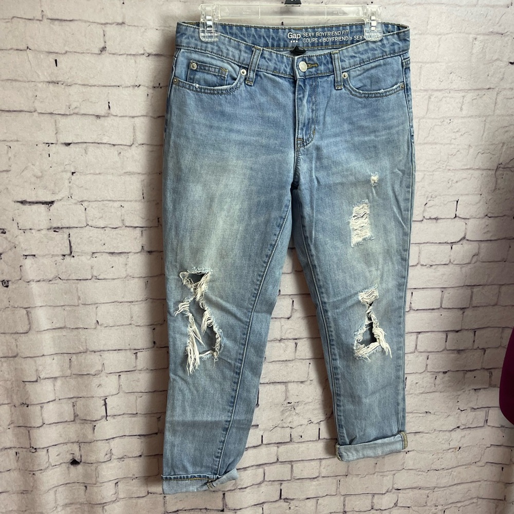 Gap Outlet size 0/25A sexy boyfriend fit distressed mid wash jeans